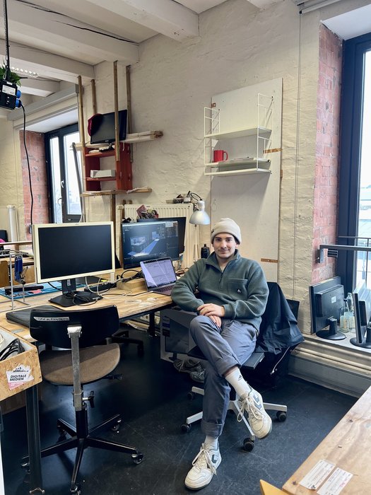 Joshua Dantz at his workstation in the digital media studio